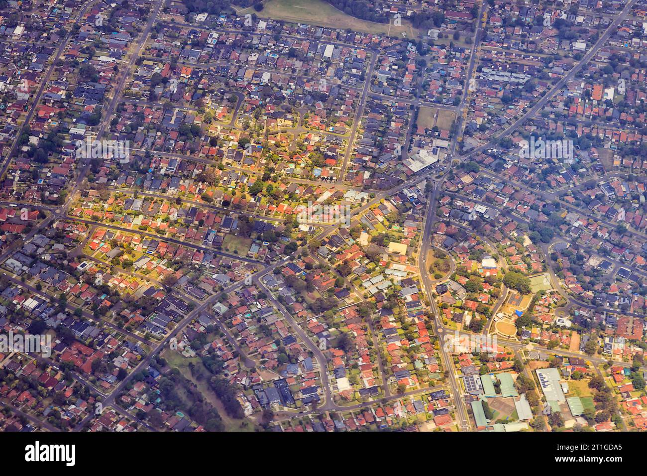 Flugzeug fliegt über Western Sydney Stadt Ryde Wohnvororte in Australien - Wohneigentum und Immobilienmarkt. Stockfoto