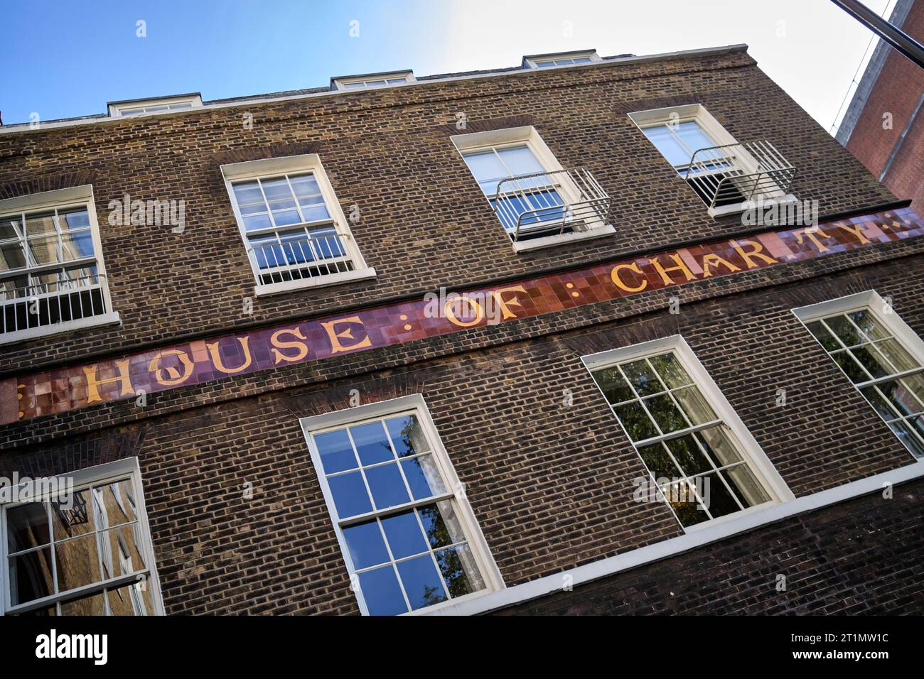 House of Charity Sign on the House of St Barnabas Soho London England UK Stockfoto