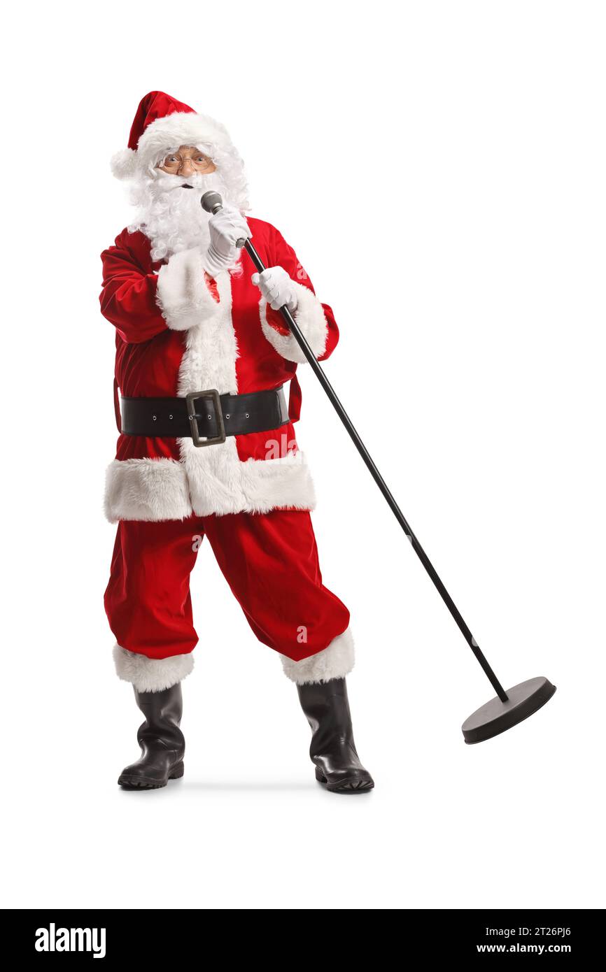 Cooler weihnachtsmann mit einem Mikrofon, das isoliert auf weißem Hintergrund singt Stockfoto
