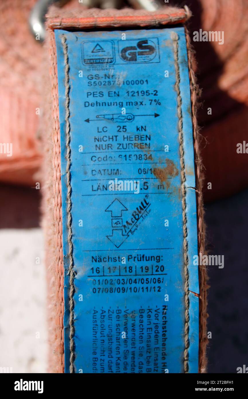 Typenschild eines Spannbandes zur Ladungssicherung Stockfoto
