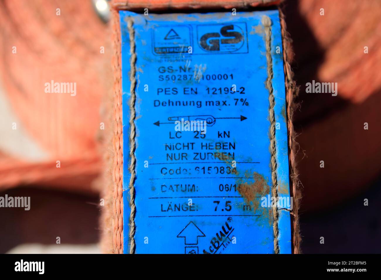 Typenschild eines Spannbandes zur Ladungssicherung Stockfoto