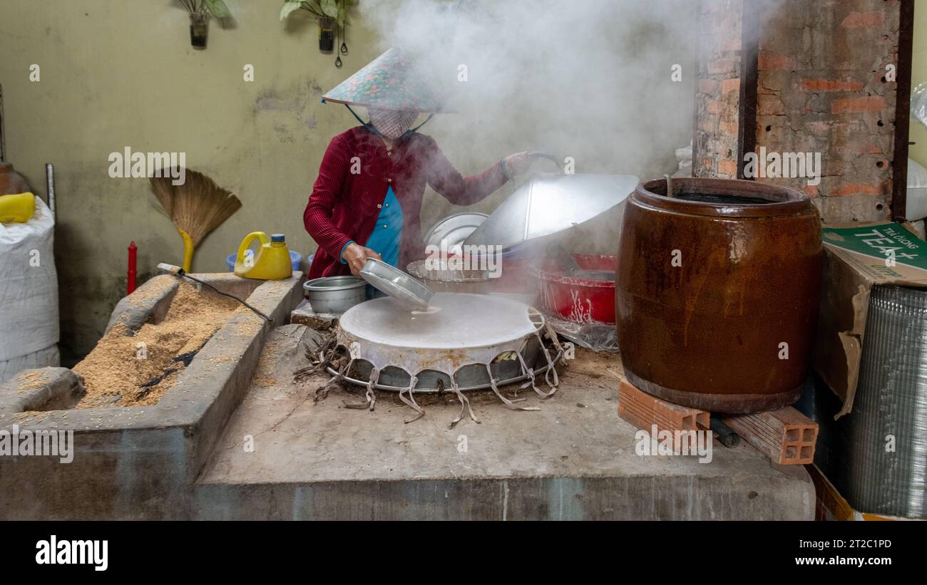 Reiskuchen Machen, Mekong Delta, Vietnam Stockfoto