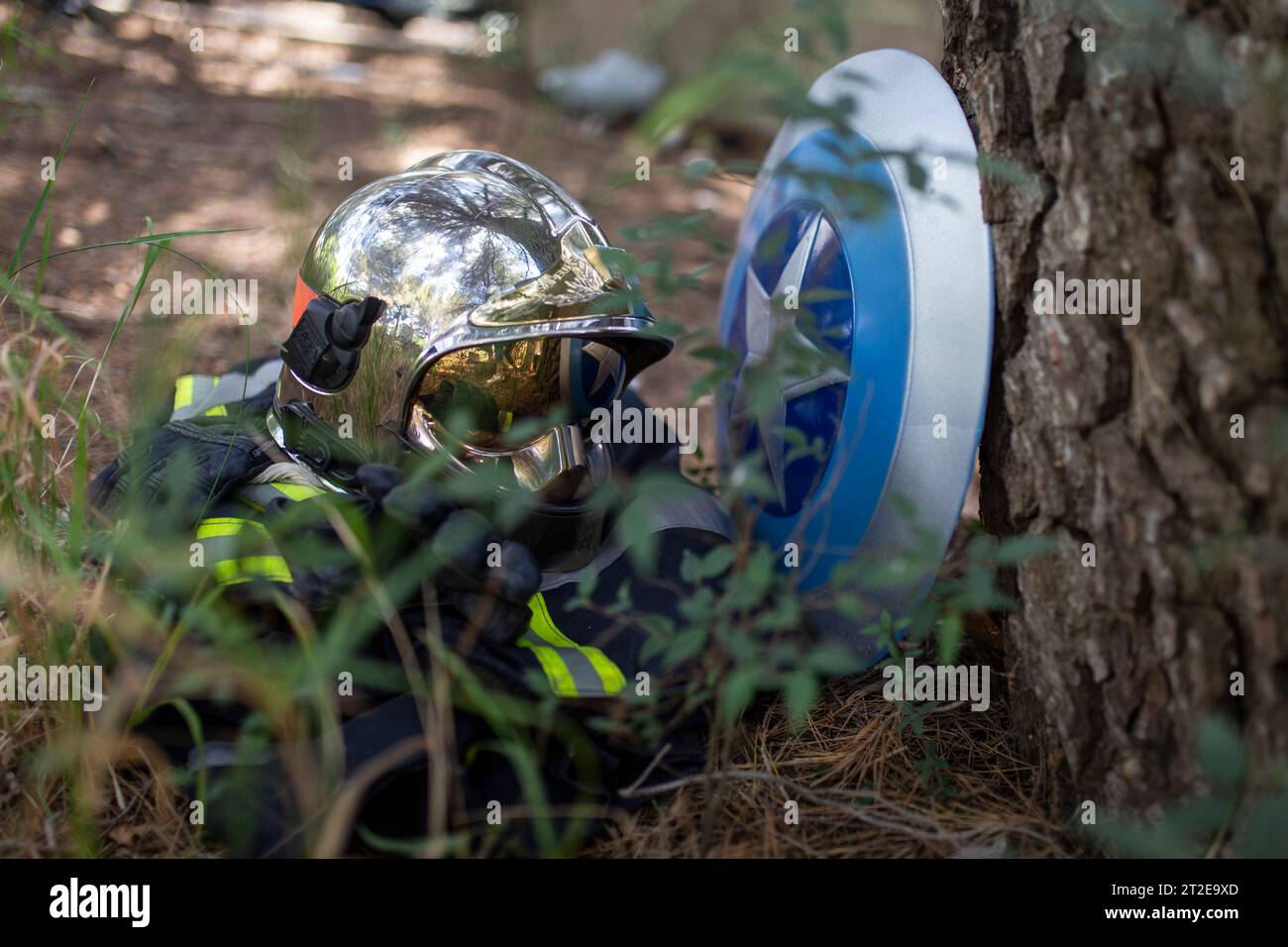 Pompiers und super héros Stockfoto