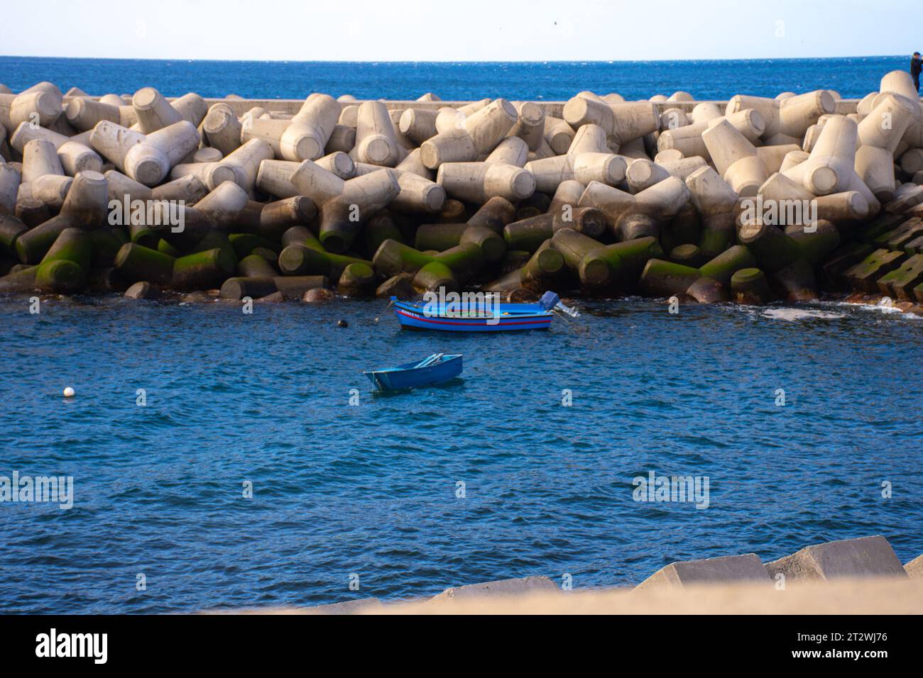 Küste bei Sonnenuntergang. Stadt in Funchal, Insel Madeira, Portugal Stockfoto