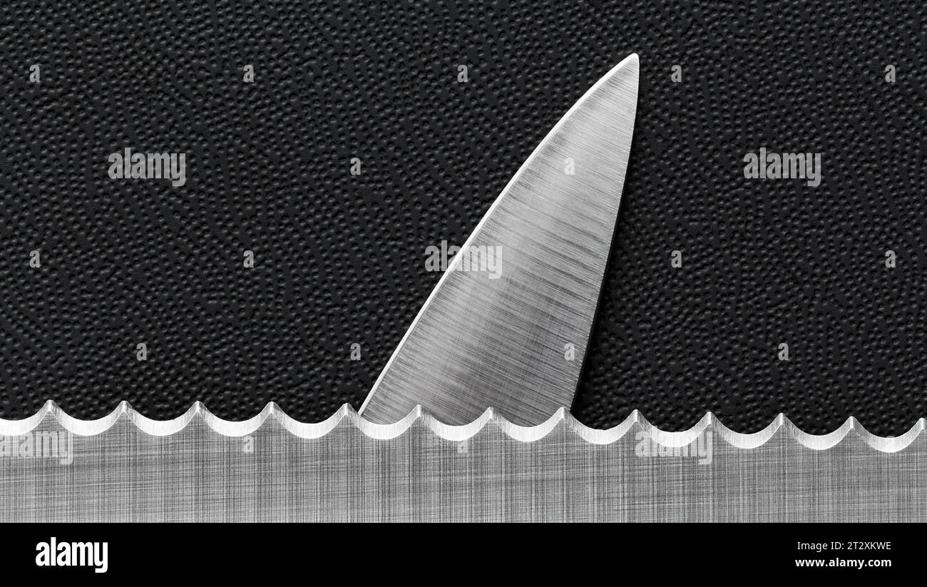 Gezackte Messerkonzeptkunst mit Haifischflosse Stockfoto