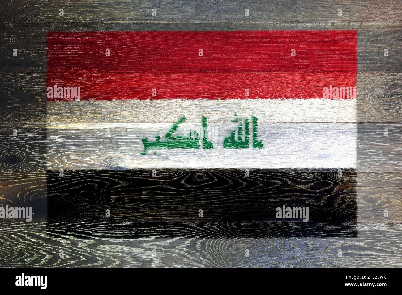 Irak-Flagge auf rustikalem alten Holzhintergrund Stockfoto