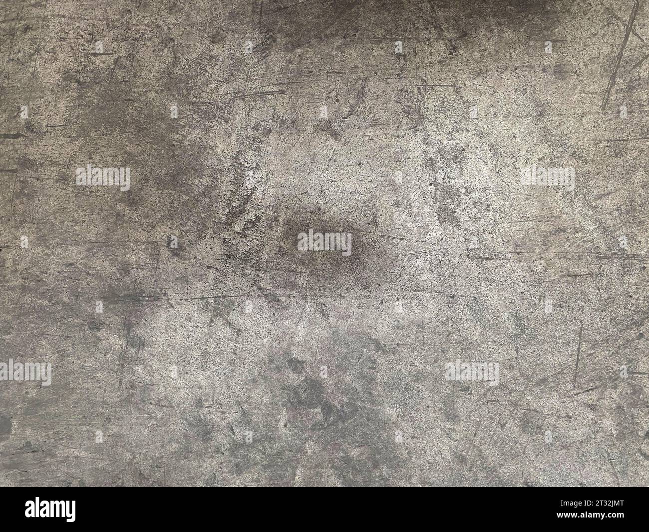 Nahtloses Hintergrundfoto von hellgrauem zerkratztem Beton. Stockfoto