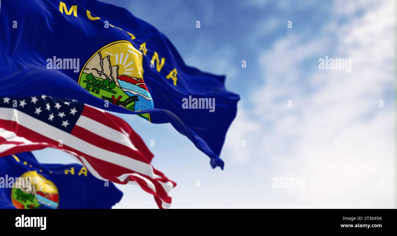 Montana State Flaggen winken im Wind mit der amerikanischen Flagge an einem klaren Tag. US-Bundesflagge. Patriotismus und Nationalstolz. 3D-Darstellung. Ri Stockfoto
