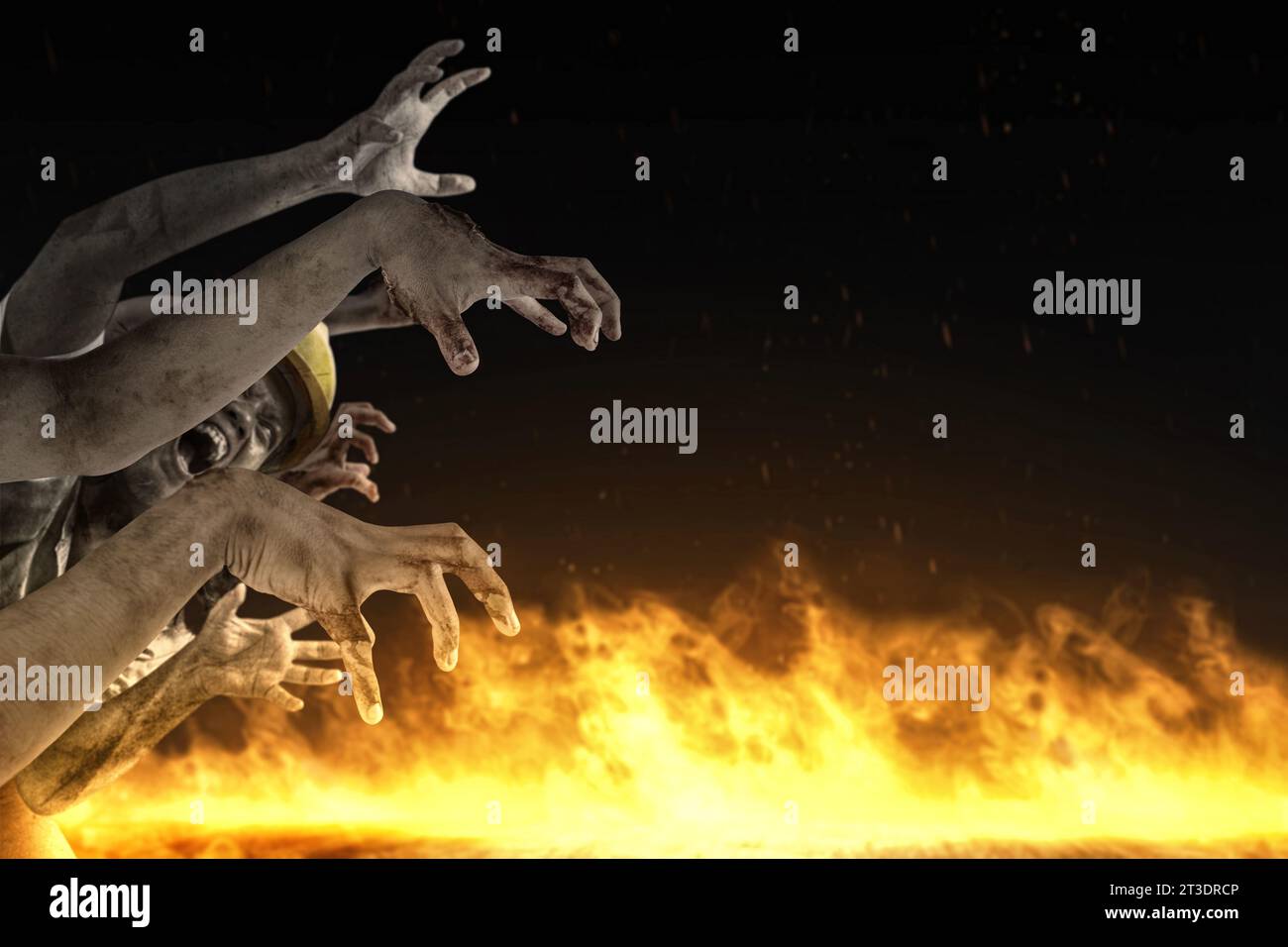Zombiehände mit Feuer Flammen Hintergrund. Gruseliges Halloween-Konzept Stockfoto