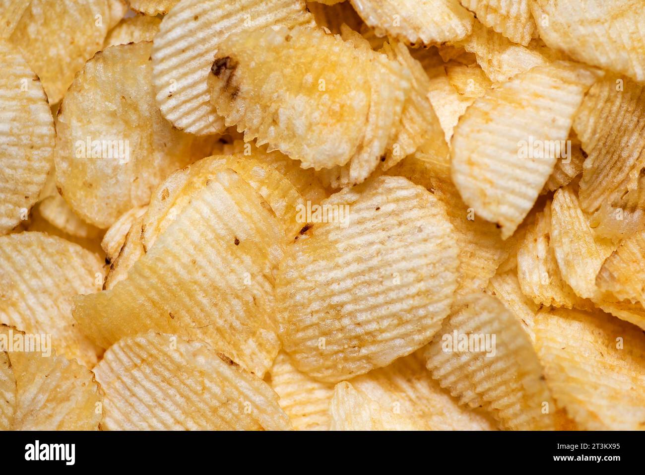 Hintergrund aus knusprigen Kartoffelchips Stockfoto