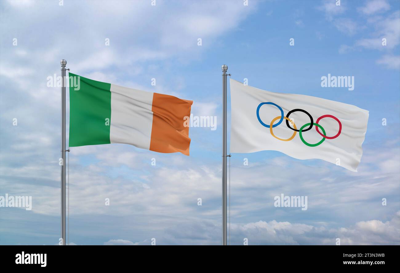 Olympische Spiele und irische Fahnen, die zusammen im Wind auf blauem bewölktem Himmel winken Stockfoto