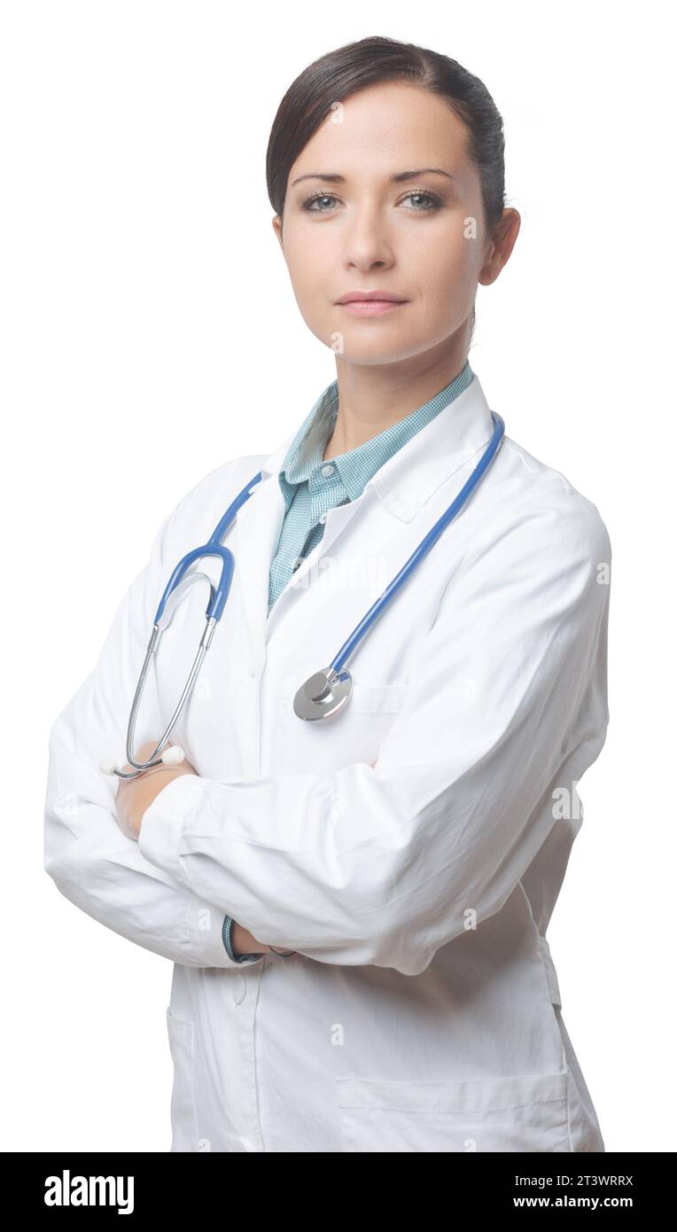Zuversichtlich Lächeln Ärztin posiert mit Kittel und Stethoskop. Stockfoto