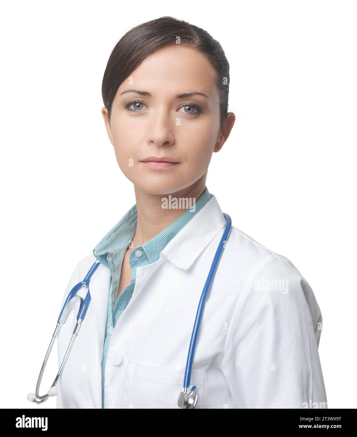 Zuversichtlich Lächeln Ärztin posiert mit Kittel und Stethoskop. Stockfoto