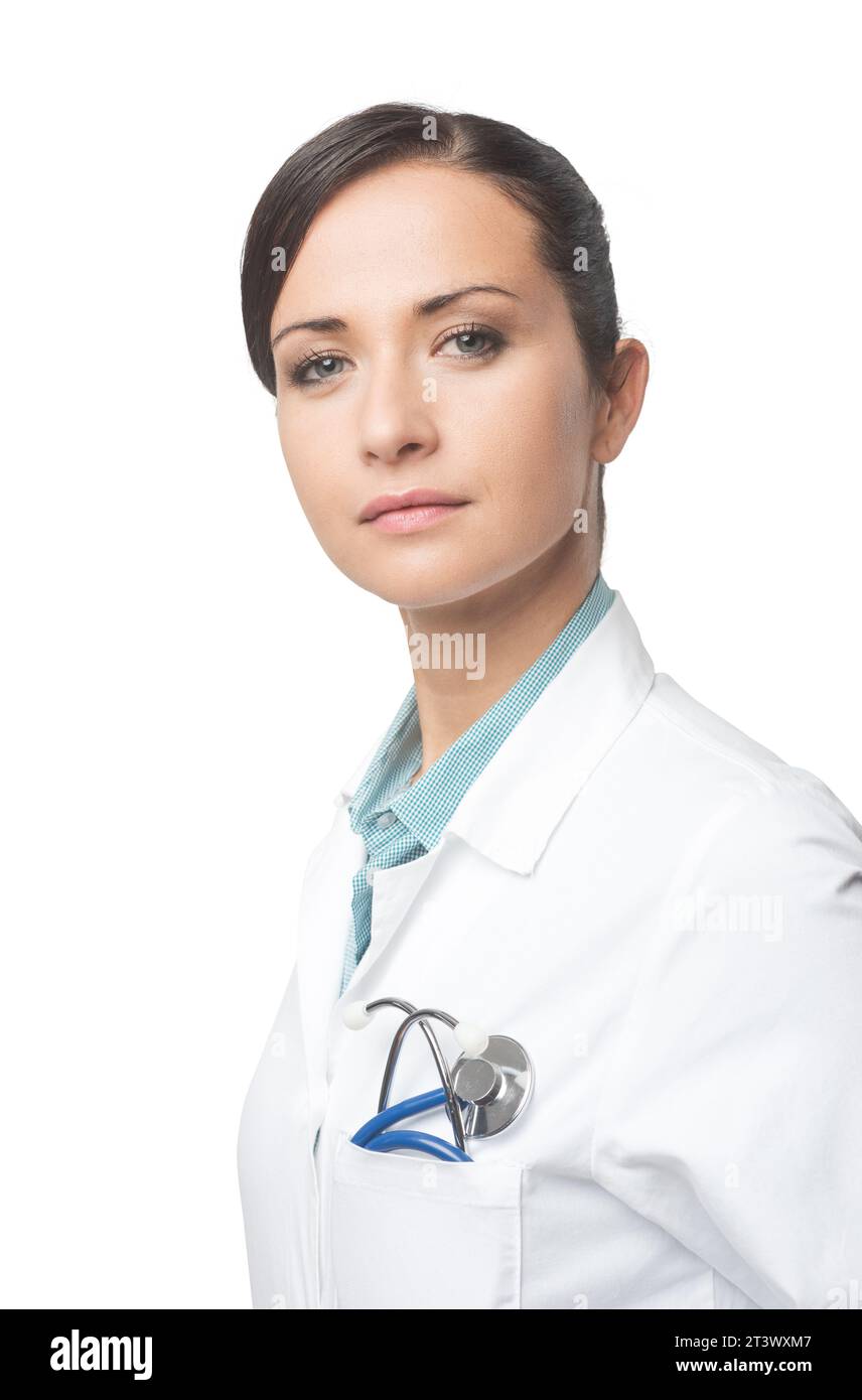 Lächelt zuversichtlich Ärztin Portrait mit Kittel und Stethoskop. Stockfoto