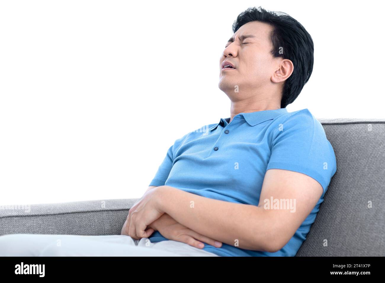 Mann mit Bauchschmerzen Stockfoto