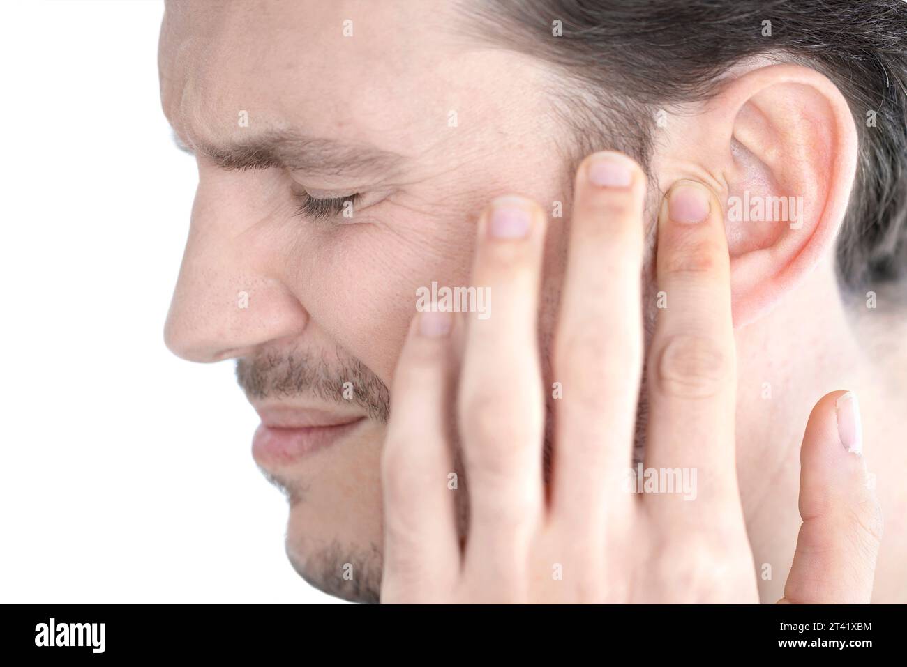 Mann mit Ohrenschmerzen Stockfoto