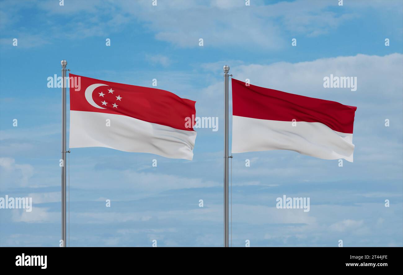 Indonesische und singapurische Flaggen schwenken zusammen auf blauem bewölktem Himmel, zwei Länder-Beziehungskonzept Stockfoto