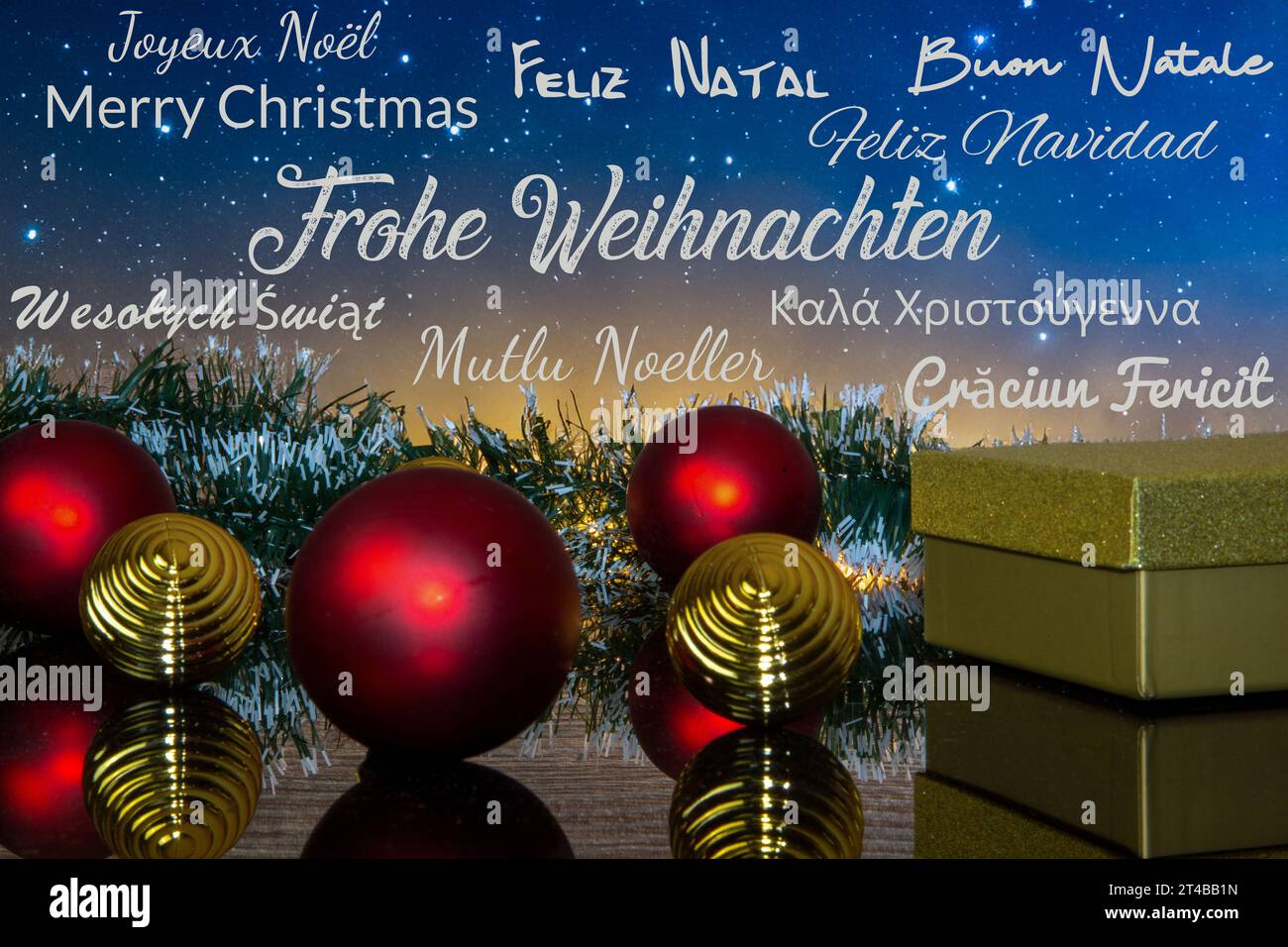 Weihnachtskarte mit Weihnachtsgrüßen in verschiedenen Sprachen Stockfoto
