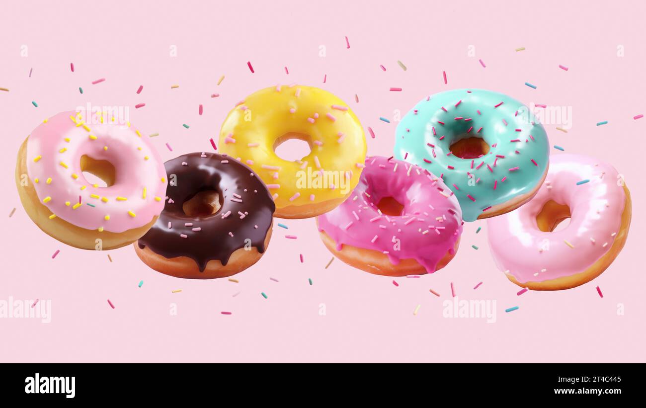 Auswahl an fallenden oder fliegenden Donuts in bunten Farben mit herabfallenden Streuseln in Bewegung vor rosa Hintergrund Stockfoto