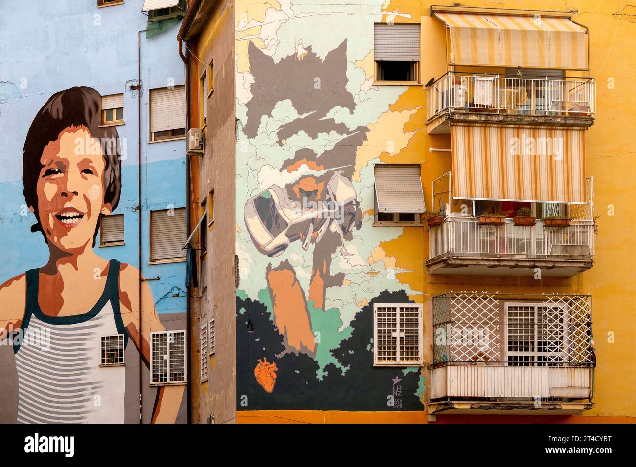 Straßenkunst an den Gebäuden der Garbatella, Rom, Italien Stockfoto