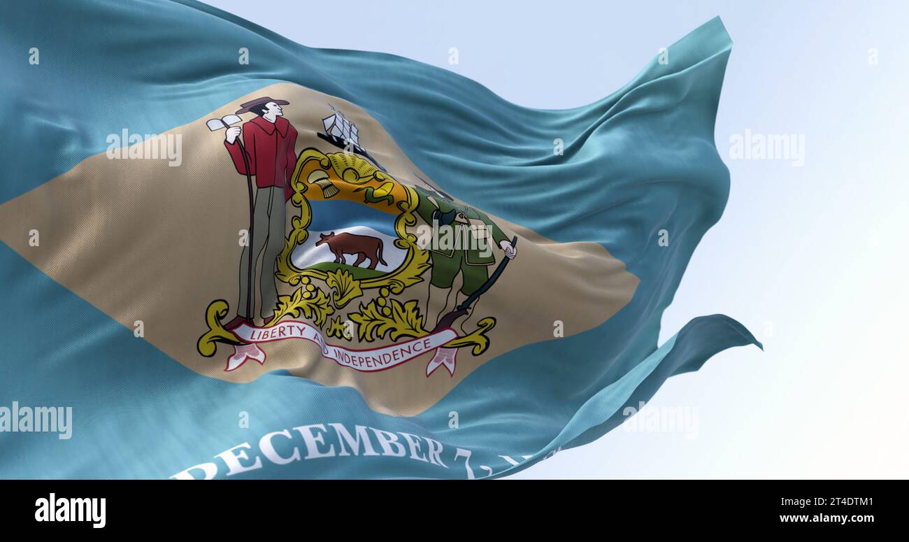 Delaware Staatsflagge winkt an klaren Tagen. Kolonialblauer Hintergrund mit einem bunten Diamanten und Staatswappen, und 7. Dezember 1787 darunter. Stockfoto