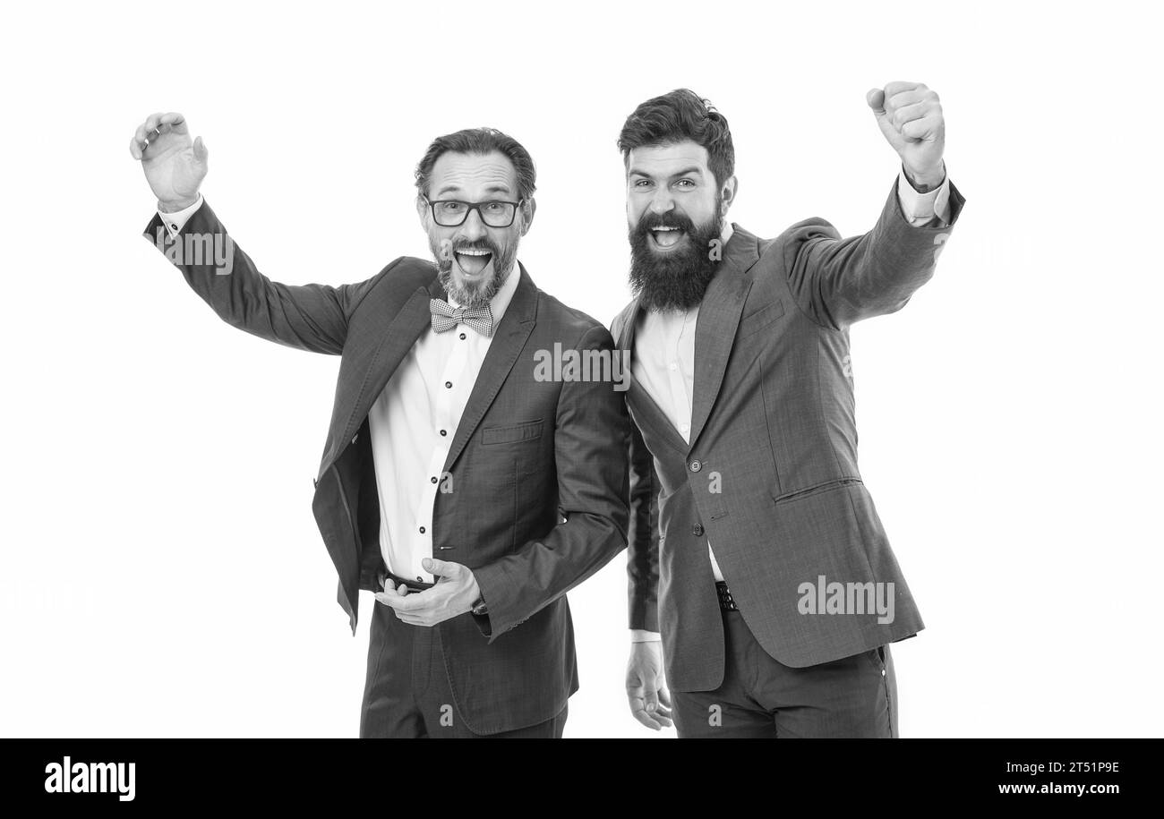 Gemeinsames Geschäftsziel. Reife Männer haben ein eigenes Geschäft. Partnerschaft von Chefs, isoliert auf weiß. Geschäftsmänner mit Bart in formellen Anzügen. Zusammenarbeit und Stockfoto