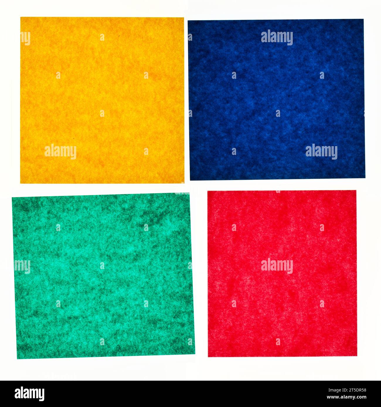 Bunte Papierstruktur. Gelber, blauer, grüner und roter abstrakter Hintergrund. Platz für die Platzierung von Text oder Notiz für Marketing. Stockfoto