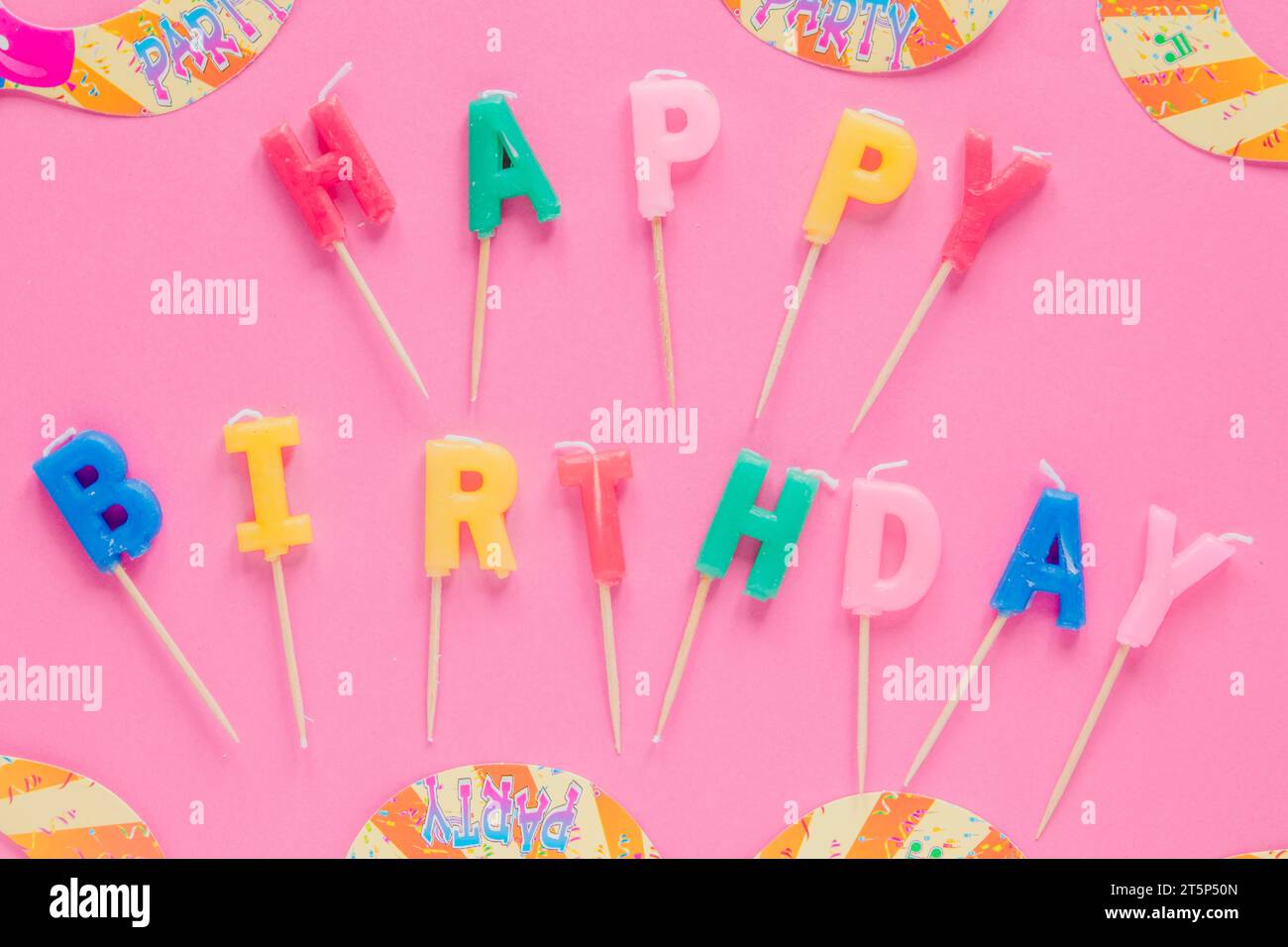 Buchstabenkerzen rosa Stockfoto