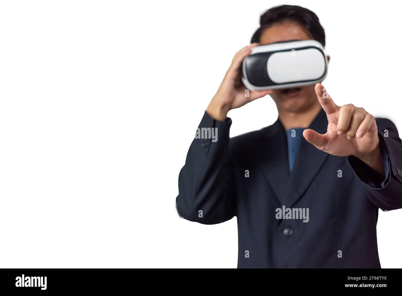 Mann mit VR-Brille erkundet eine digitale Welt der Spiele und Innovation virtuelle Umgebung futuristisches Technologiekonzept auf weißem Hintergrund. Stockfoto