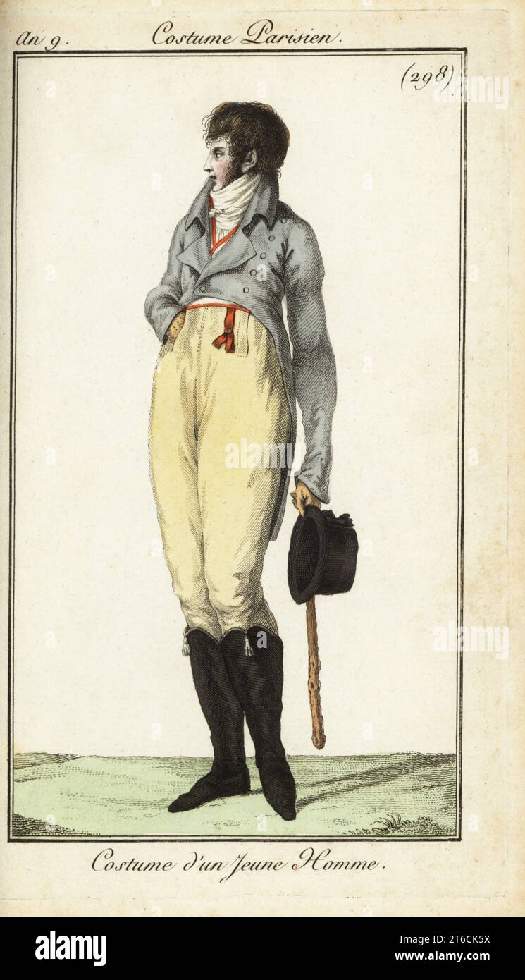 Outfit of a Young man or Incrovable, Mai 1801. Er trägt Krawatte, Weste, hochgezogenen Reitmantel, Reithose und Stiefel und trägt Hut und Knüppel. Kostüm dun Jeune Homme. Handkolorierter Kupferstich aus Pierre de la Mesangeres Journal des Modes et Dames, Paris, 1801. Die Illustrationen in Band 4 stammen von Carle Vernet, Bosio, Dutailly und Philibert Louis Debucourt. Stockfoto