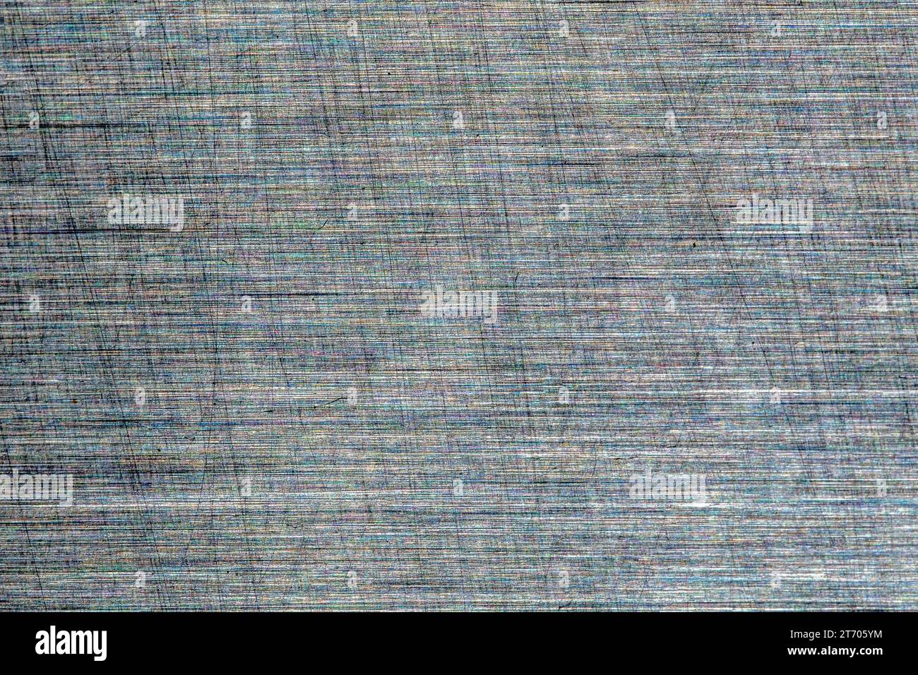 Gebürsteter Stahl oder metallischer Hintergrund mit mittlerer Dunkelheit. Stockfoto