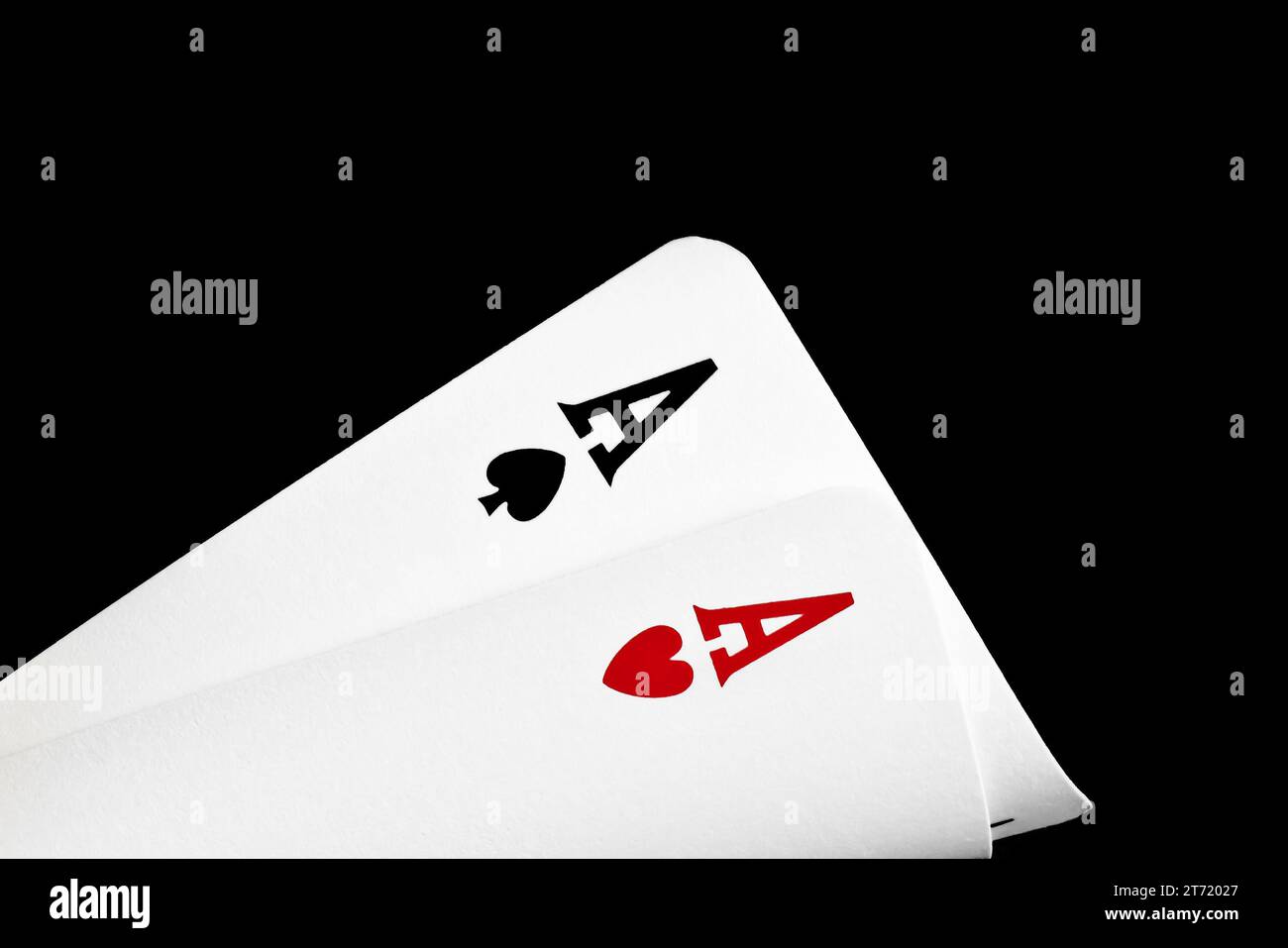 Detail eines Paares Sieger-Asse auf schwarzem Hintergrund Stockfoto