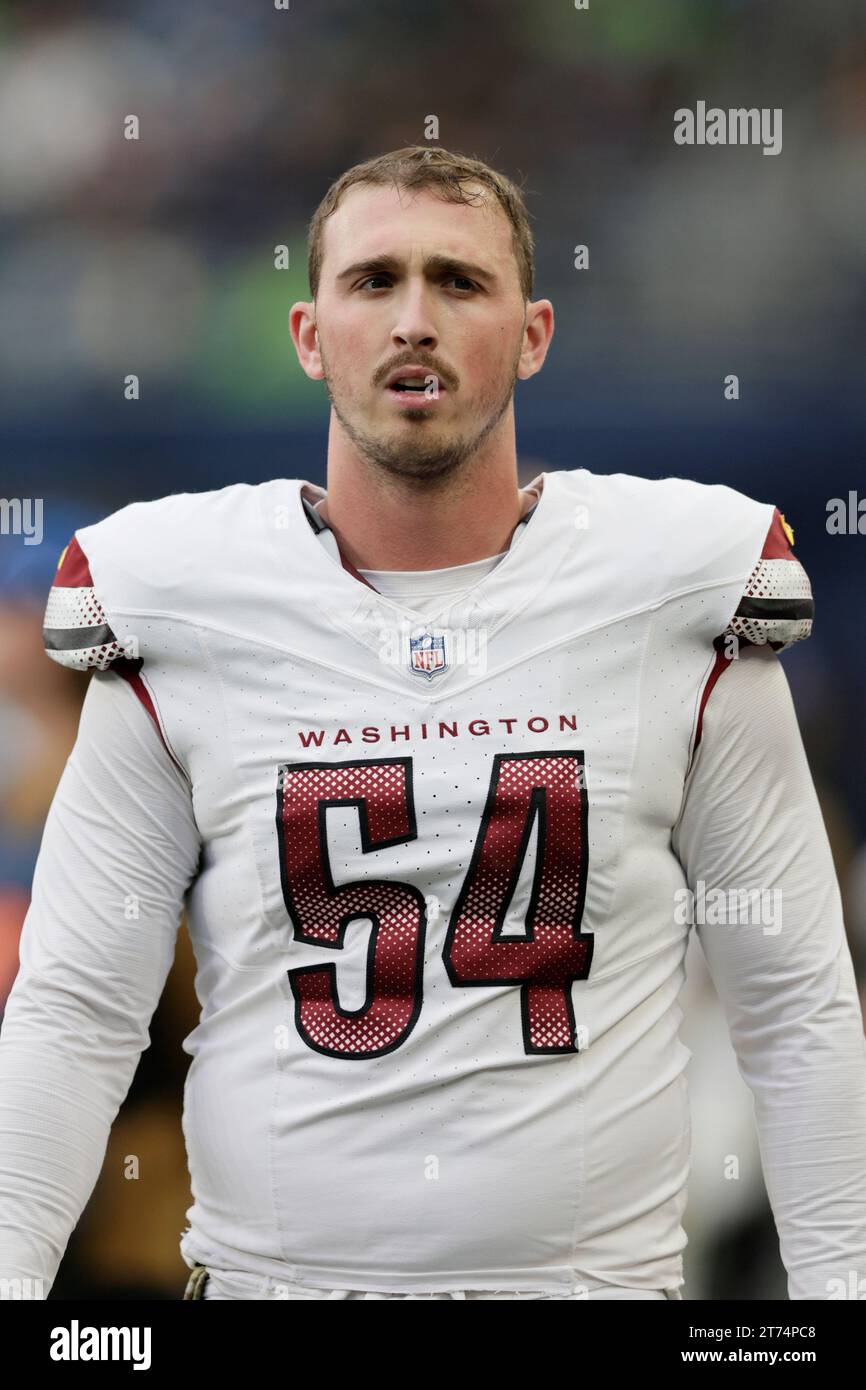 Washington Commanders long snapper Camaron Cheeseman walks on the sidelines with his hemmet off against the Seattle Seahawks in an NFL football game, Sunday, Nov. 12, 2023, in Seattle. The Seahawks won 29-26. (AP Photo/ John Froschauer) Stockfoto