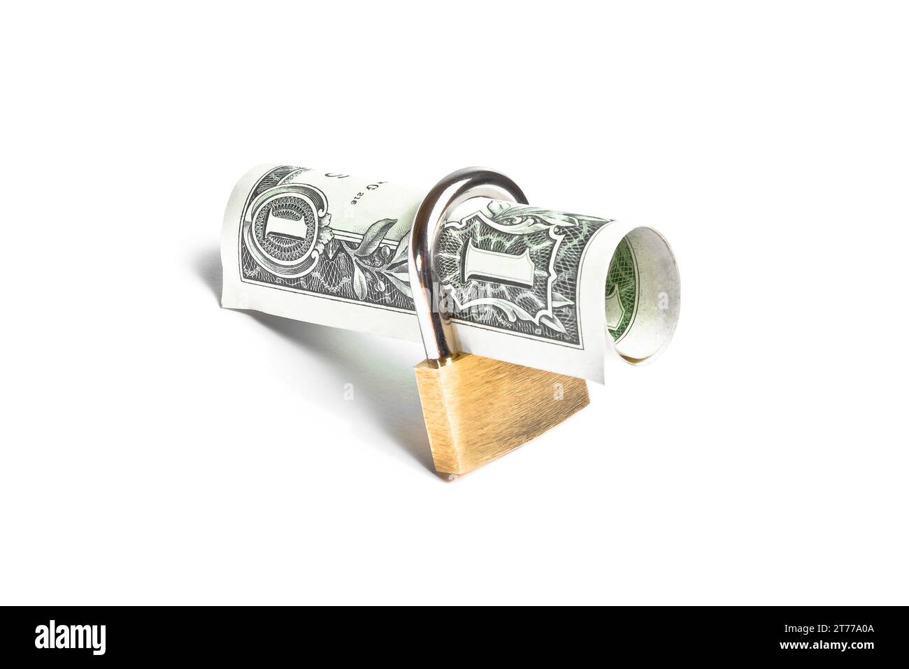 Dollar-Banknote gerollt mit Schlosssicherheit. Geld für Sicherheit und Investitionen. Stockfoto