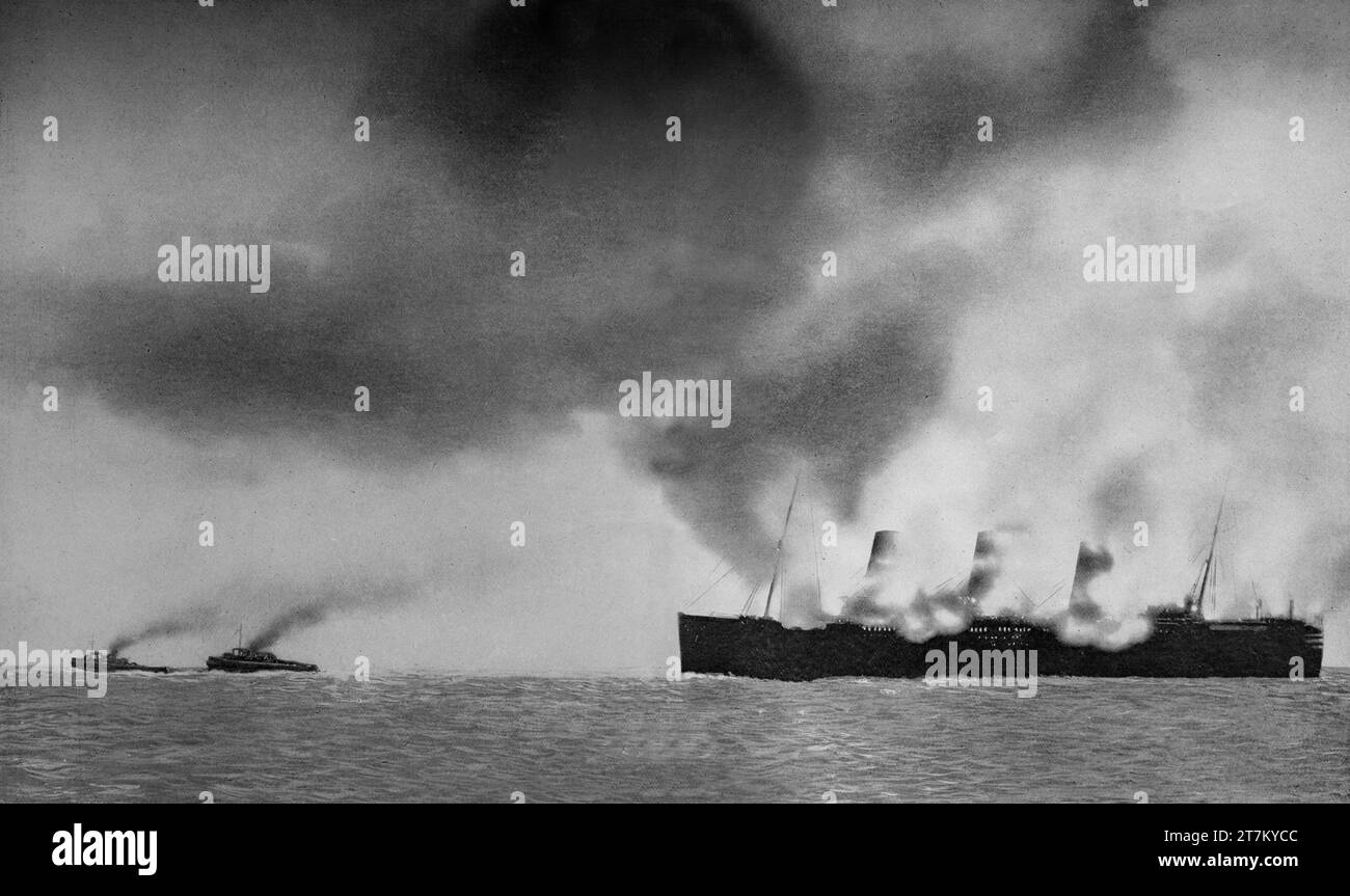 Das Ende der „Empress of Britain“, eines Linienschiffes der kanadischen Pazifikflotte, nachdem es während des Zweiten Weltkriegs am 26. Oktober 1940 von deutschen Sprungbombern angegriffen wurde. Etwa 70 Meilen nordwestlich von Irland wurde sie von einem deutschen Langstreckenbomber Focke-Wulf FW 200C Condor entdeckt, der das Schiff dreimal überspannte und zweimal mit 250 kg (550 lb) Bomben traf. 600 der 5643 Menschen an Bord wurden gerettet. Stockfoto