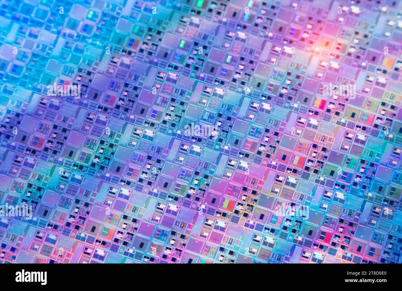 Hintergrund von Silizium-Wafer-Halbleitern mit Neonfarbe, integrierten Schaltungen zur Herstellung von CPU und GPU Stockfoto