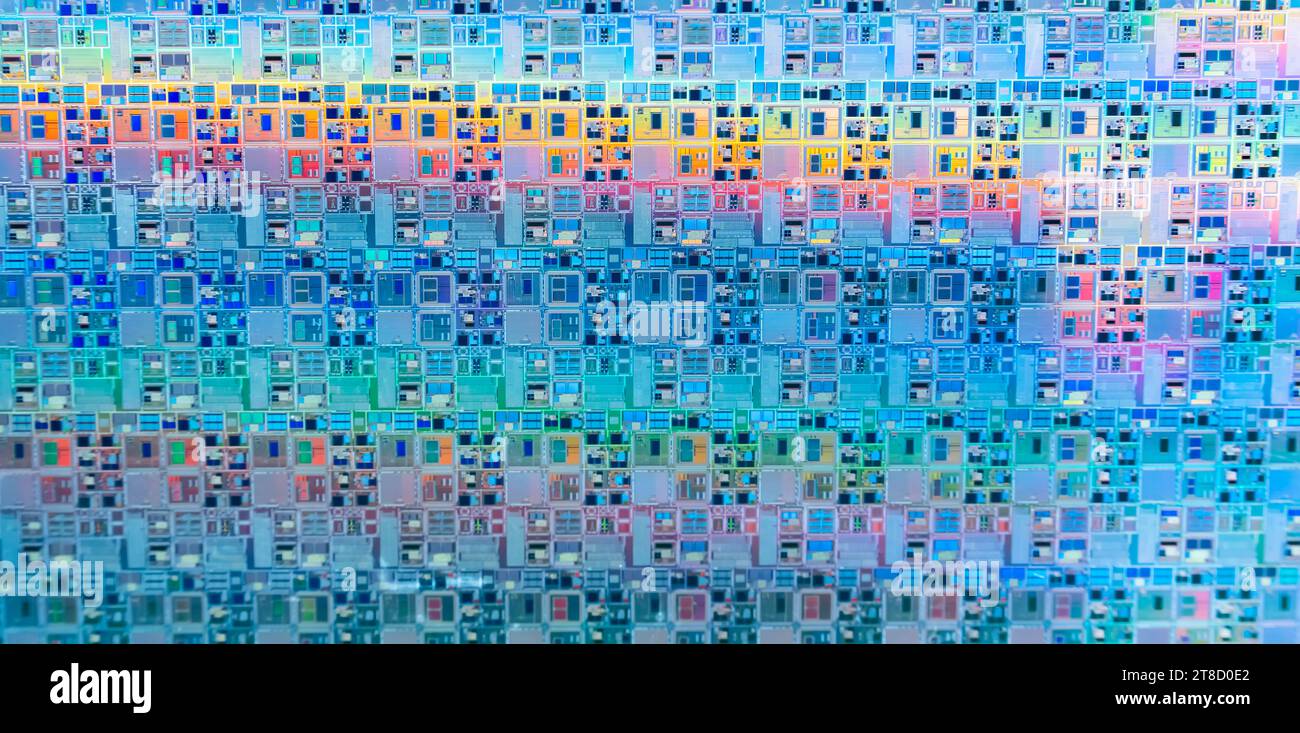 Hintergrund von Silizium-Wafer-Halbleitern mit Neonfarbe, integrierten Schaltungen zur Herstellung von CPU und GPU Stockfoto