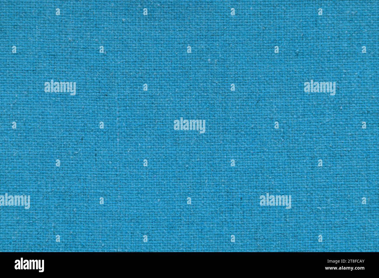 Blauer Sackleinen mit schöner Leinwandstruktur aus blauem Stoff im Retro-Stil mit schöner blauer Leinwandstruktur als Vintage Sackleinen für Hintergrund und Stockfoto