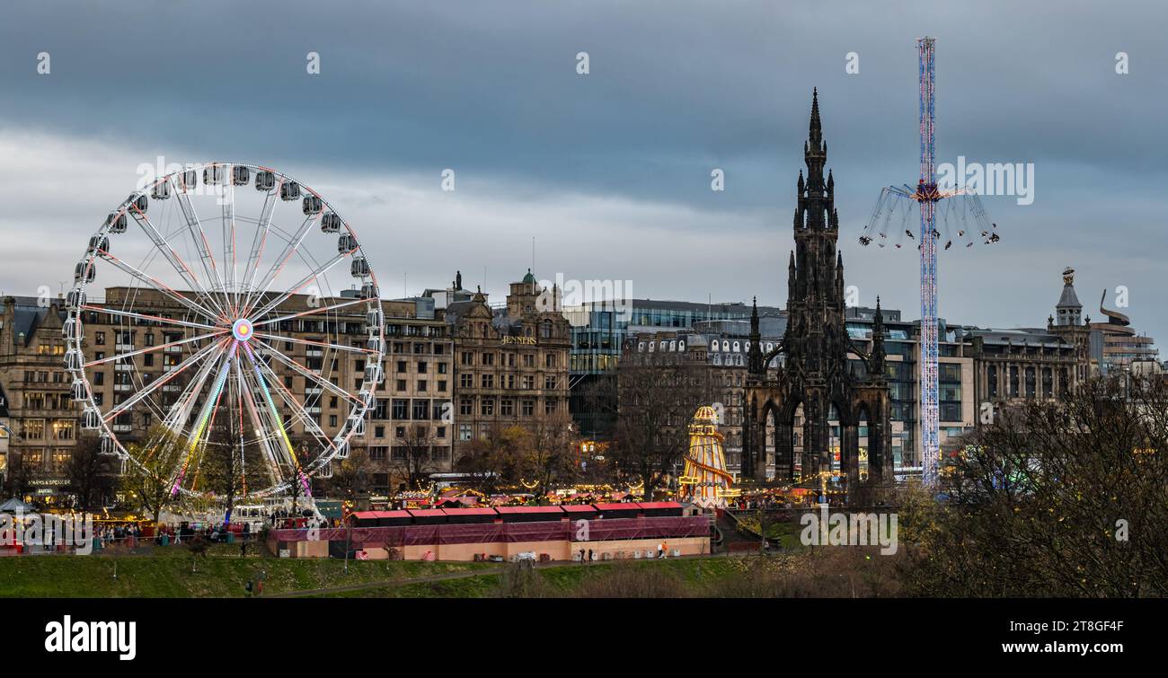 Edinburgh, Schottland, Vereinigtes Königreich, 20. November 2023. Weihnachtsszenen: Die Lichter des Weihnachtsmarktes und große Riesenrad- und Sternflyer-Vergnügungsfahrten sind eine Attraktion in der Dämmerung. Quelle: Sally Anderson/Alamy Live News Stockfoto