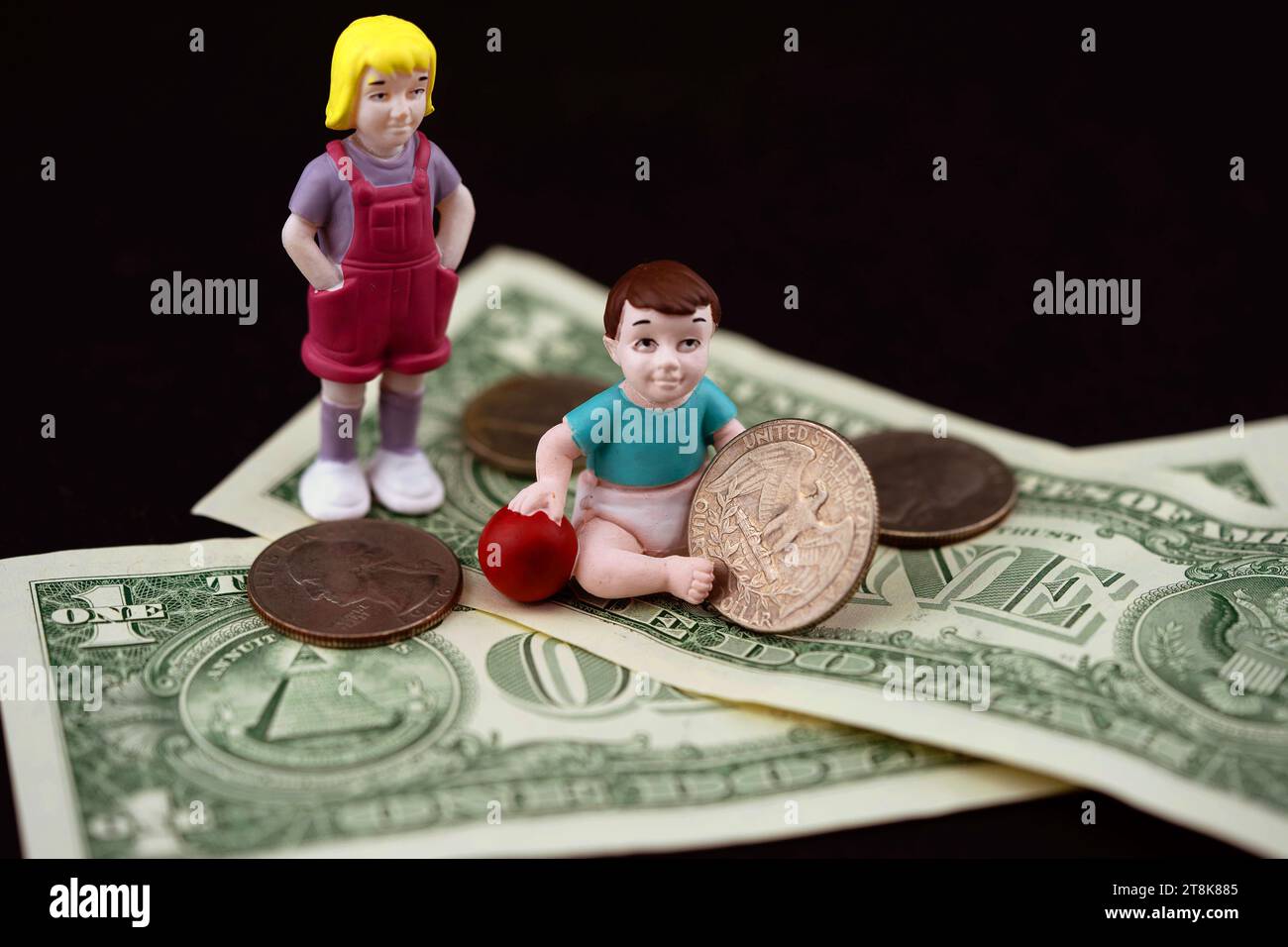 Kinder werden finanziell unterstützt, Kindergeld, symbolisches Image Stockfoto