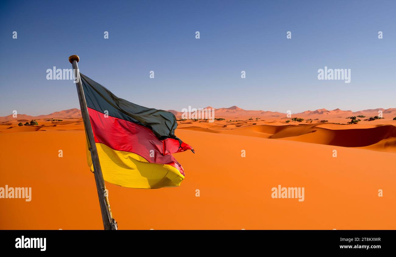 Deutsche Flagge in der Sahara, KI generiert Stockfoto