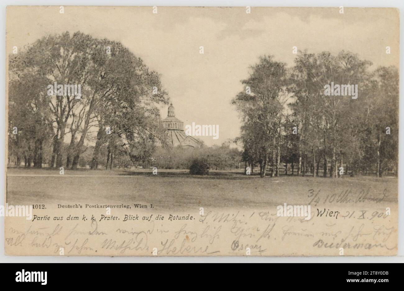 Teil aus dem k. k. Prater. Blick auf die Rotunde. Vienna, Deutsch's Postkartenverlag, Produzent, 1900, Karton, Kollotypie, Inschrift, VON, Wien, NACH, Krumbach, ANSCHRIFT, Frau, [...] [...], Krumbach, Nied. Oest., Lindenhof, NACHRICHT, 3, 4 10 Uhr abends, 21.X.(1)900, L. Mitzi! Versammelt auf Nummer 22, senden wir Ihnen herzliche Grüße. Wir freuen uns darauf, Sie bald zu sehen, Mathilda, Helene, Oscar Biedermann, Prater, 1873 Weltmesse Wien, Park, Medien und Kommunikation, Ausstellungen, Ansichtskarten mit Transliteration, 2. Bezirk: Leopoldstadt, öffentlicher Garten, Park, Rotunde, Handschrift Stockfoto