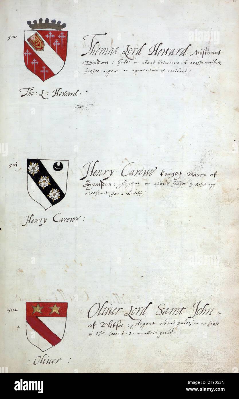 Buch der englischen Heraldik, Wappen von Thomas Lord Howard, Henry Carewe und Oliver Lord Saint John, dieses Buch der englischen Heraldik wurde um ca. 1589. Das Manuskript gehörte der Familie Spencer, bekannt durch Inschriften auf den ersten Flügelblättern, einschließlich des Mottos „Dieu defende Le Droit“ (Gott verteidigt die Rechte). Dieses Motto wurde seit langem mit der Familie Spencer aus England, der Familie von Prinzessin Diana, sowie den Spencers, die zu den Gründern von Virginia gehörten, in Verbindung gebracht Stockfoto