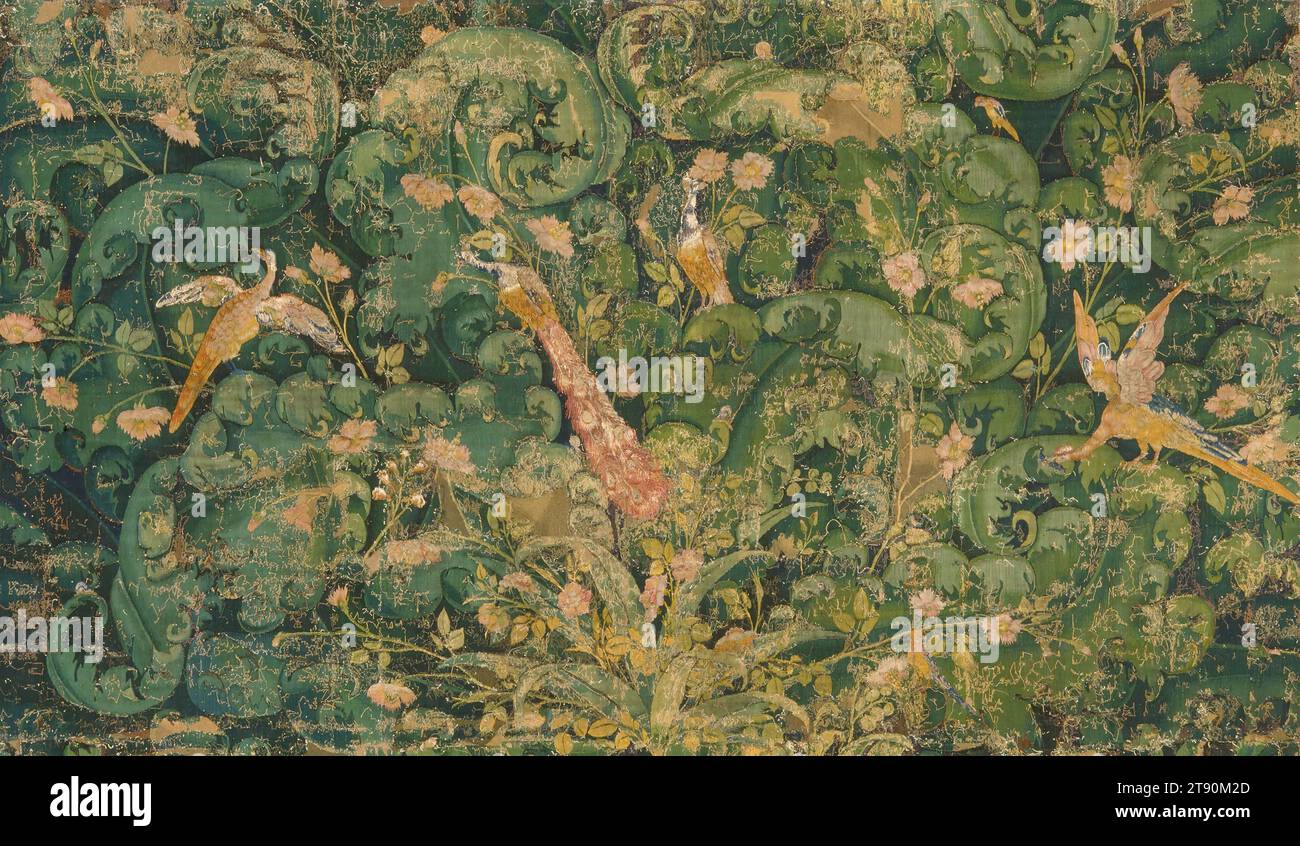 Verdure-Gobelin-Fragment mit Vögeln, 16. Jahrhundert, 91 x 154 cm (231,1 x 391,16 cm), Wolle, Seide; Gobelin-Gewebe, Flandern, im 16. Jahrhundert wird der Begriff Grün – was sowohl auf Französisch als auch auf Englisch „Grün“ bedeutet – für Wandteppiche verwendet, die mit großen Blättern bedeckt sind, oft mit Blumen und, in höherwertigen Beispielen, Vögeln und Tieren. Solche All-Over-Muster konnten problemlos an Wandteppiche jeder Größe angepasst werden. Sie erforderte nicht die genaue Abgrenzung und komplexe Schattierung, die für menschliche Figuren erforderlich waren, so dass das Weben relativ schnell voranschreiten konnte. Stockfoto