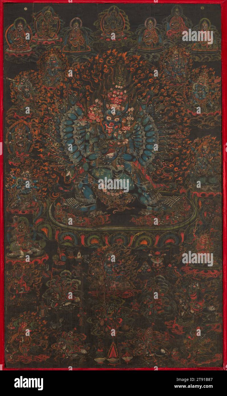 Vajrabhairava, 18. Jahrhundert, 49 1/2 x 29 Zoll (125,73 x 73,66 cm), undurchsichtige Farben und Gold auf Baumwolle, Tibet, 18. Jahrhundert, dieser schwarzgrundige Thangka hätte einen erfahrenen Praktizierenden in der Meditation geführt, der sich darauf konzentrierte, die Angst vor dem Tod zu überwinden. Die zentrale Gottheit, Vajrabhairava, wird in seiner wildesten Form mit zahlreichen Köpfen dargestellt, darunter einem Wasserbüffel als zentralem Kopf. Jedes seiner 32 Waffen trägt eine Waffe und er trampelt Dämonen und Hindugötter mit Füßen. Die Grausamkeit des Bildes sollte den Praktizierenden vor eigenen Ängsten und Wahnvorstellungen schützen, wenn er darüber nachdenkt Stockfoto