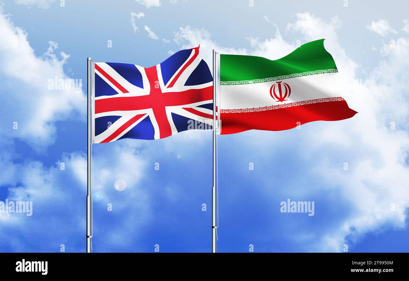 Iran, britische Fahnen winken zusammen gegen den blauen Himmel Stockfoto