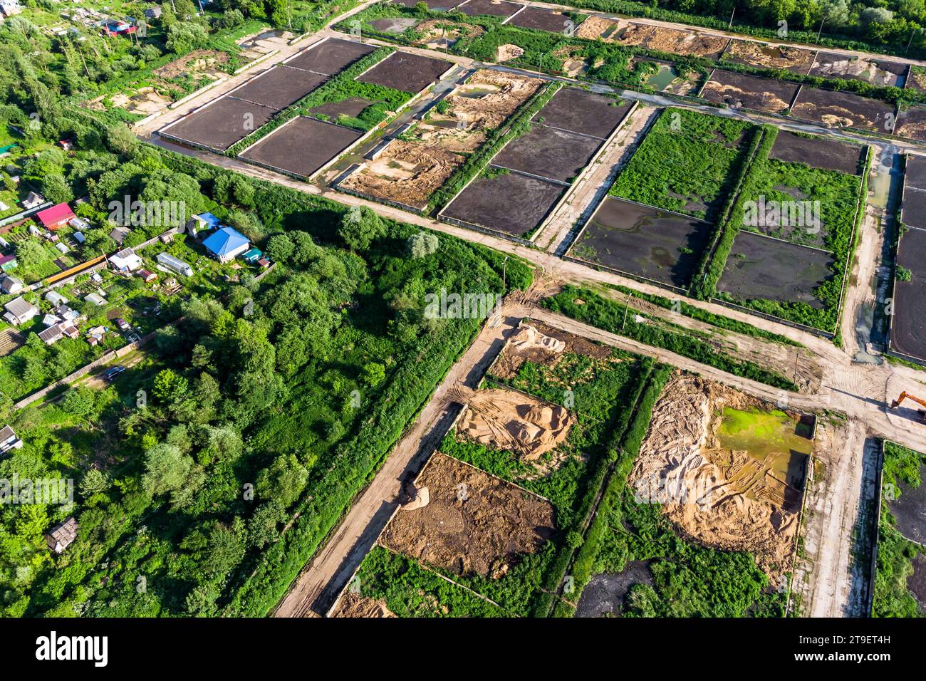 Luftaufnahme von Schlammkarten von Abwasserbehandlungsanlagen Stockfoto
