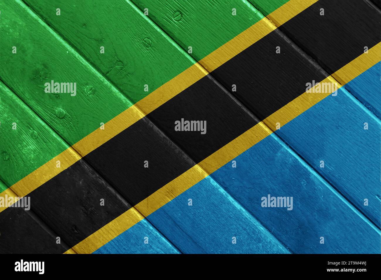 Flagge der Vereinigten Republik Tansania auf strukturiertem Hintergrund. Concept Collage. Stockfoto