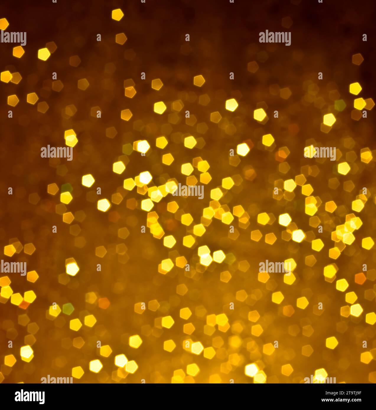Abstrakter goldener Bokeh-Hintergrund, Fantasy-Stil Stockfoto