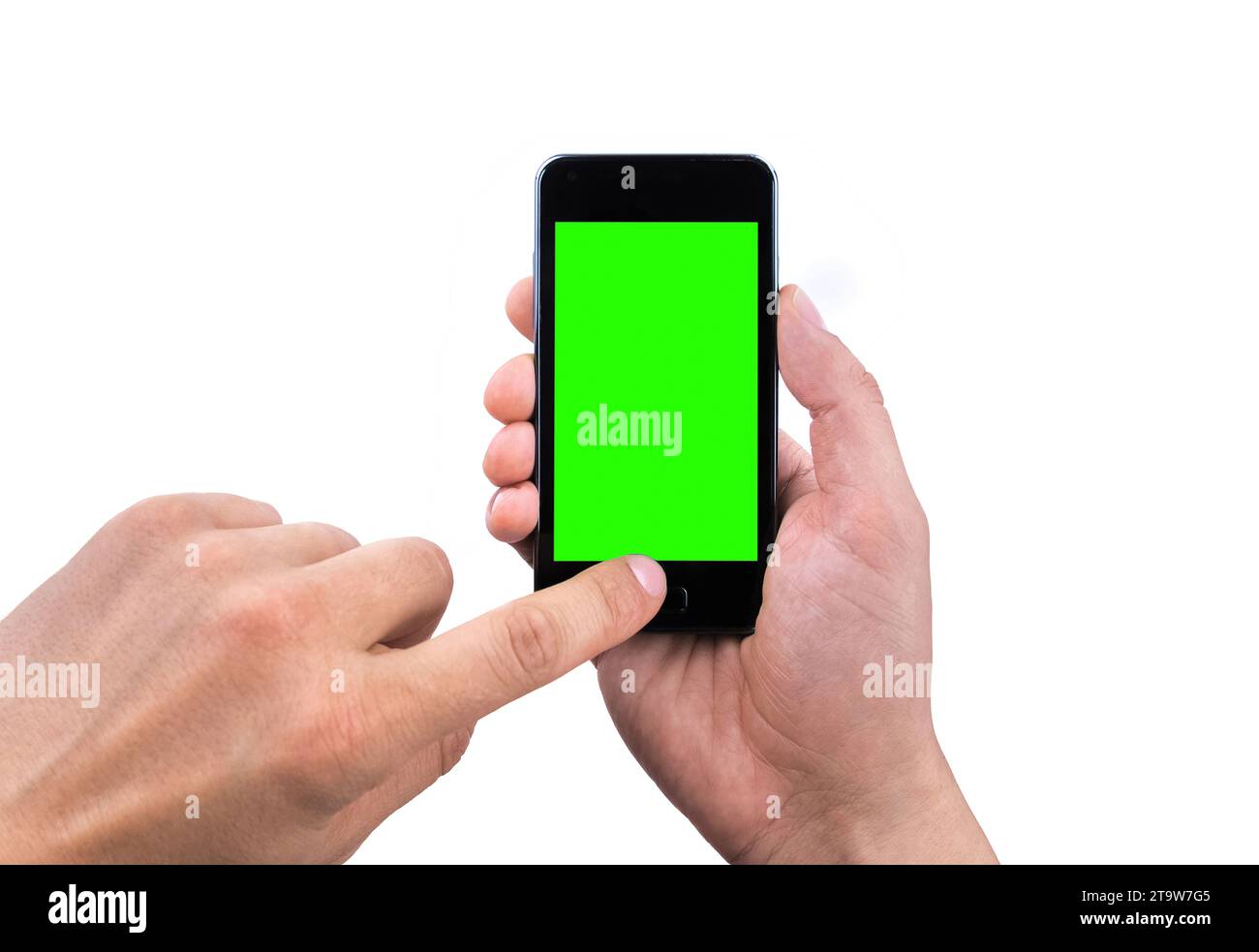 Hand-of-man-Handy mit Chroma-Schlüssel-grünem Bildschirm auf weißem Hintergrund, neues Technologiekonzept Stockfoto
